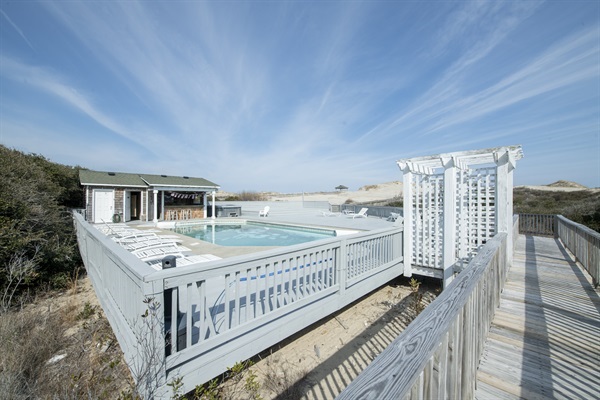 Escape to The Hemingway's pool deck for the ultimate staycation experience! Enjoy the beautiful view of the Outer Banks from this private sun lounger-filled terrace.