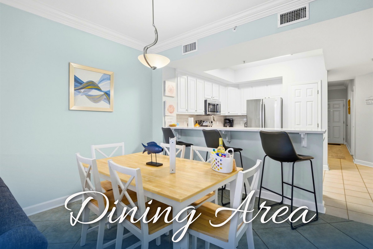 Gather around the dining table for meals, card games, or planning the next beach adventure.