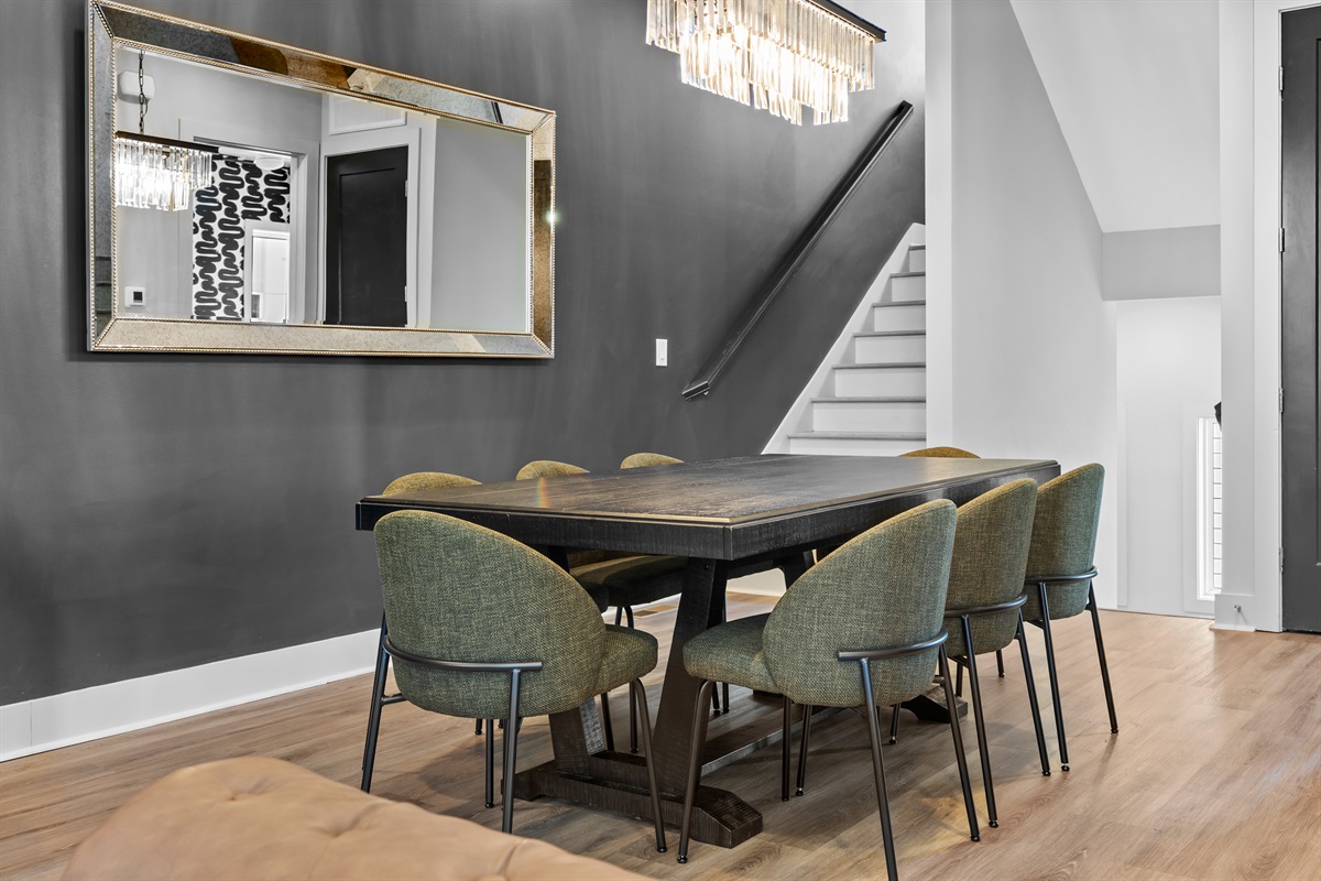 Dining Room: Gather around the stylish table with chic chairs for unforgettable meals and memories!