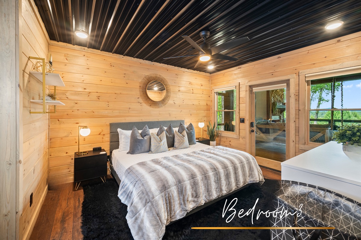 Warm wood tones and plush bedding make this bedroom a tranquil retreat.