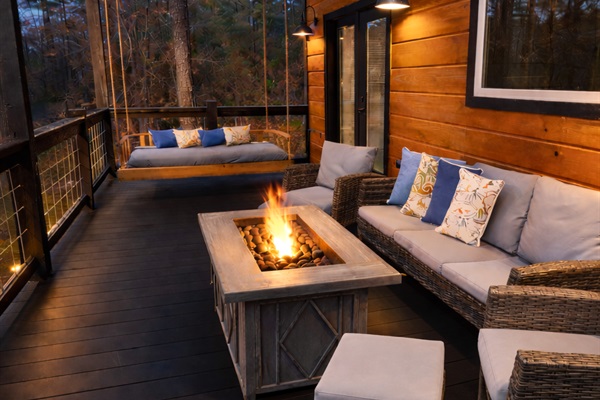 Relax on the back porch with a propane firepit