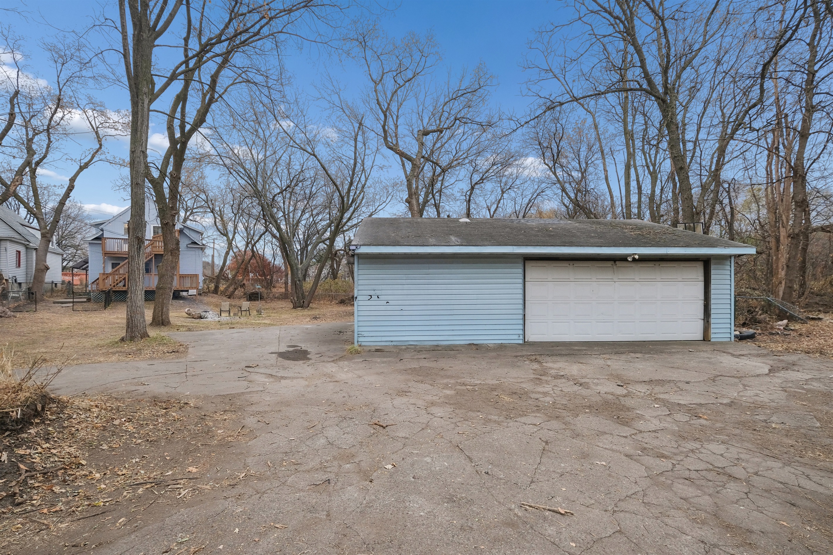 Guests can park in the back outside the garage, off a private alley.
