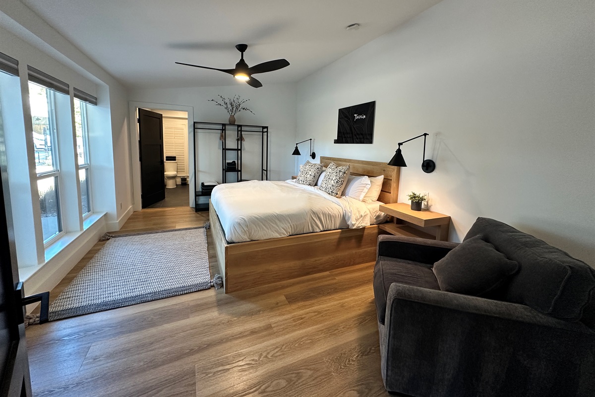 A spacious and serene king retreat featuring a private en-suite bath, refined finishes, and a peaceful ambiance.