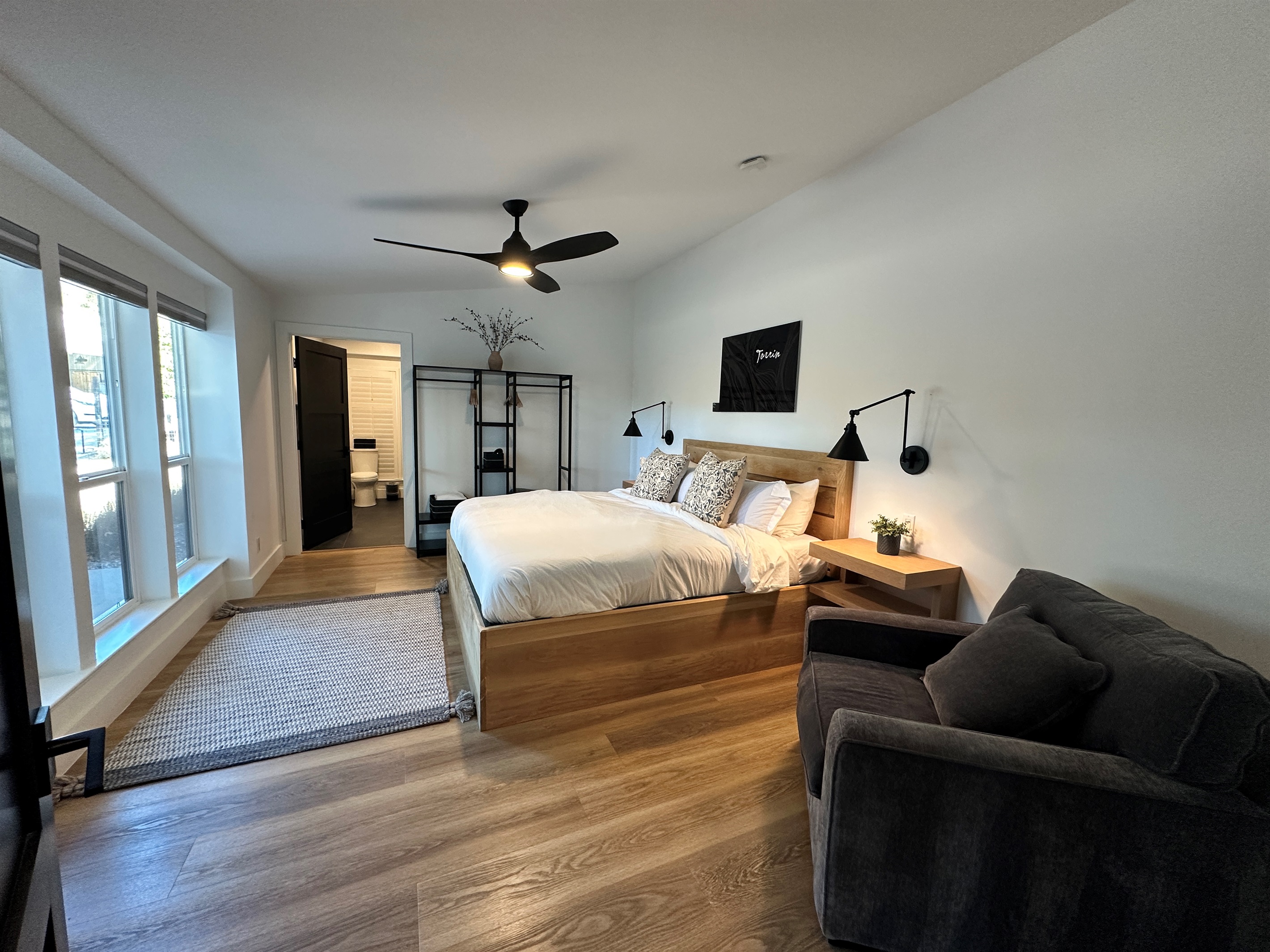 A spacious and serene king retreat featuring a private en-suite bath, refined finishes, and a peaceful ambiance.