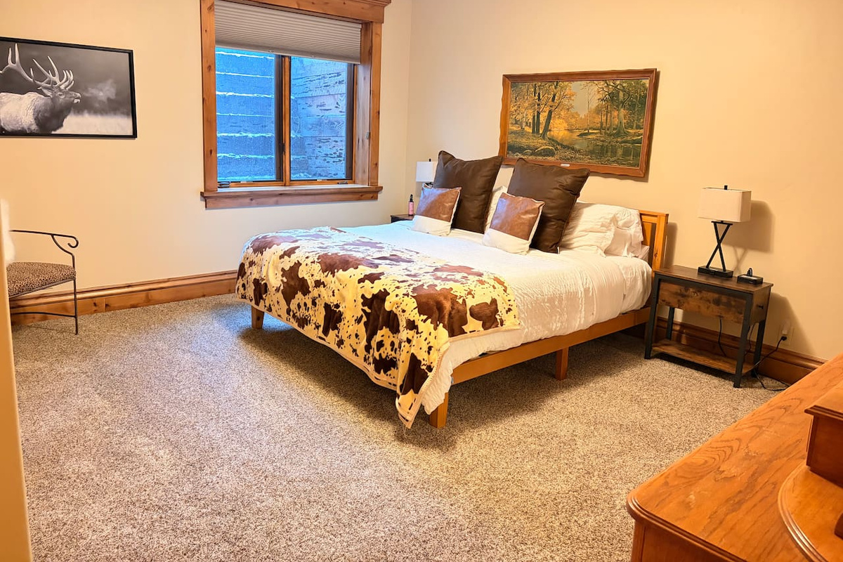 Relax and recharge in our beautifully appointed bedrooms, featuring high-quality linens and ample storage for you. Bedroom 2, located downstairs, offers a king bed and a spacious private en-suite bathroom—creating a comfortable and private retreat.