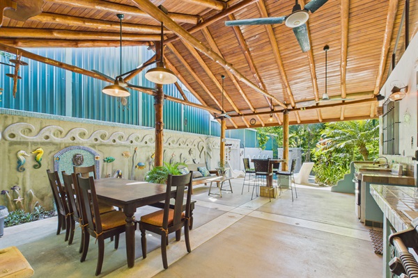 Huge outdoor rancho with large dining table, outdoor kitchen with mini fridge, gas grill, oven and sink.  Half Bathroom 5 is located outside in the Rancho