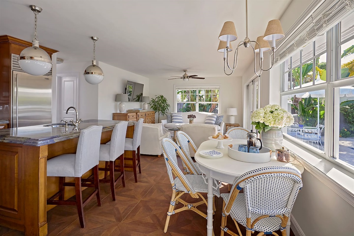 The kitchen and living areas flow seamlessly together, creating the perfect space for family gatherings or relaxed entertaining.