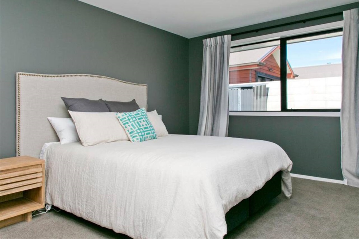 Main Bedroom 2 which also has an Ensuite and TV on the wall 