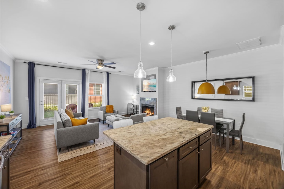 The central island doubles as a prep station and casual dining spot, ideal for family and friends.
