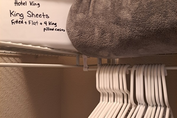 Spare sheets and a warm blanket for each bed.