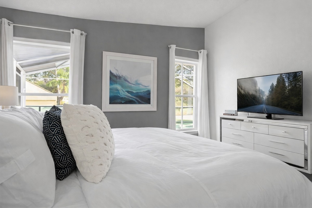 Master bdroom with 50" Smart TV