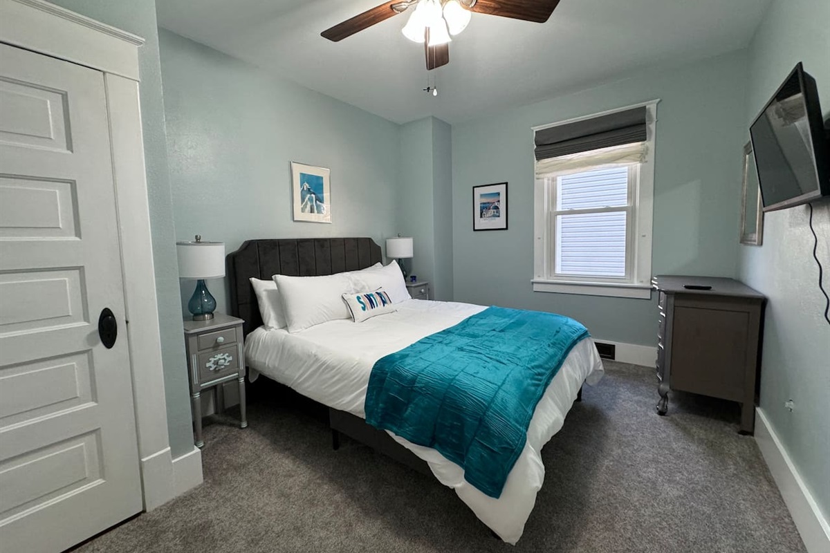 The Santorini Room is a calm and relaxing refuge on the Main Level offering a Queen Bed and Roku smart TV.