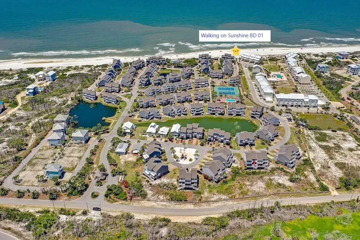 Drift above it all &mdash; the Barrier Dunes community sits right on the Gulf, and this aerial shows just how close you really are.