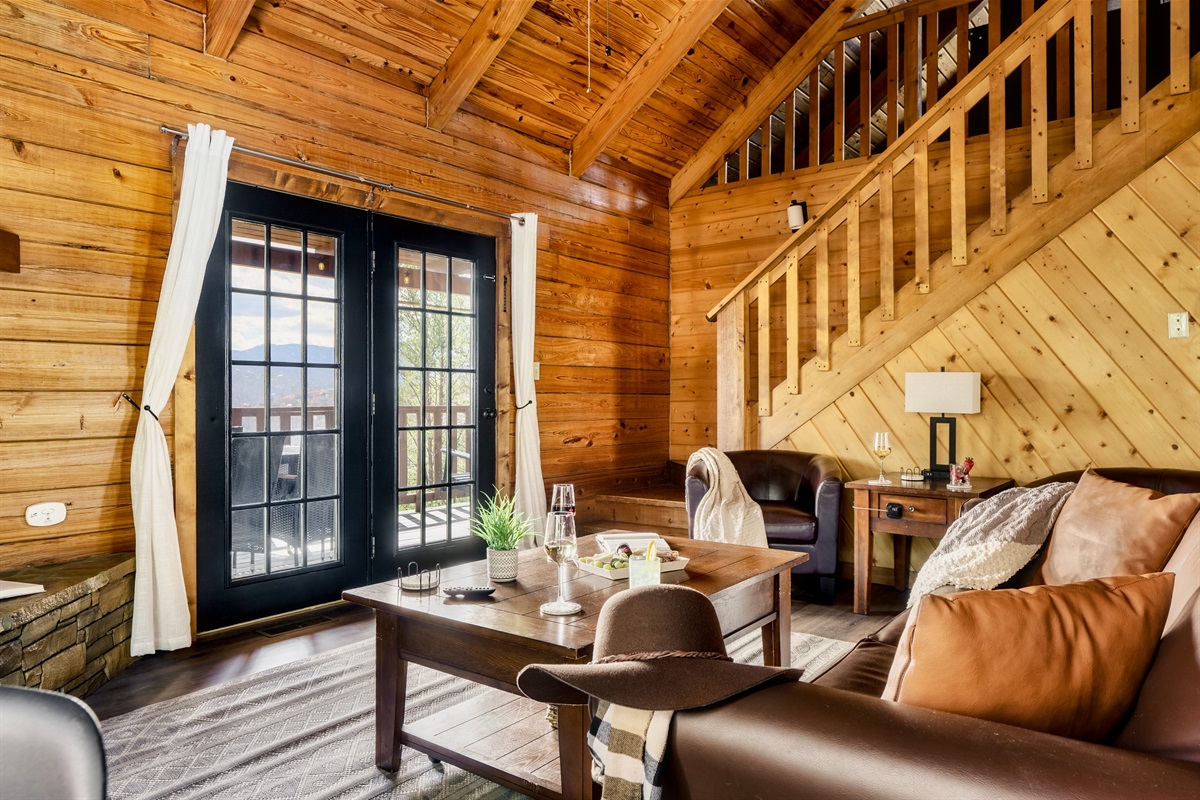 The luxury cabin interior and stunning mountain views make the stay comfy and relaxing. 