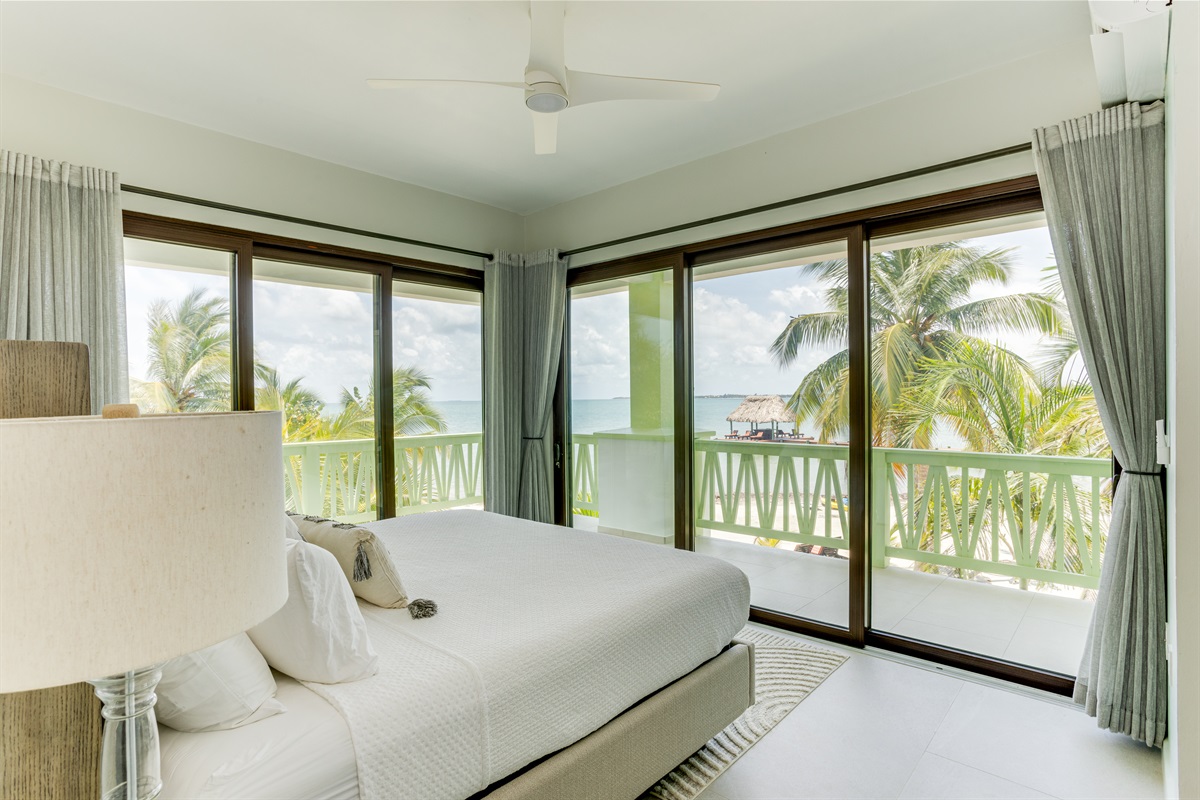 Bedroom 1: King Bed, Beach View & Patio Access