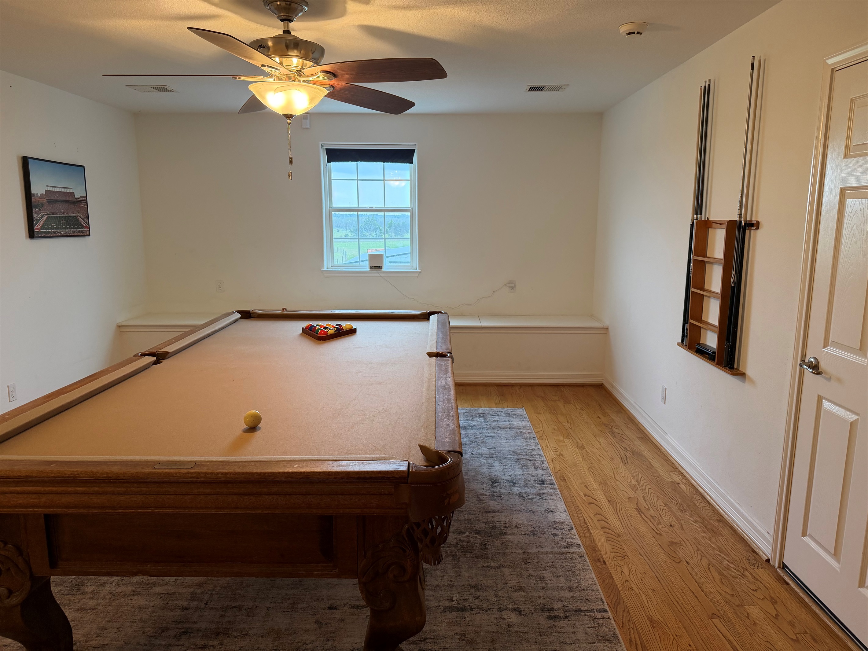 Window seat in game room.