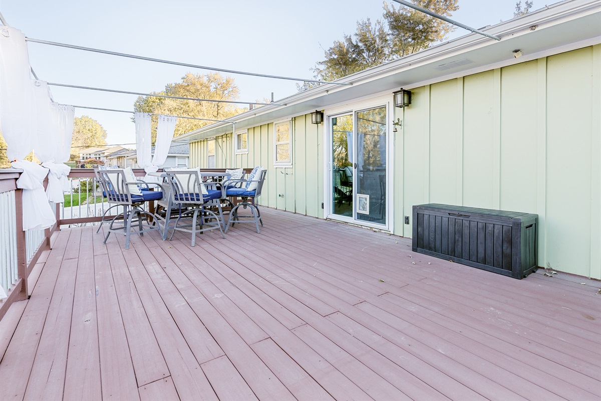 Alternate deck view featuring generous space and curtain system for added privacy.