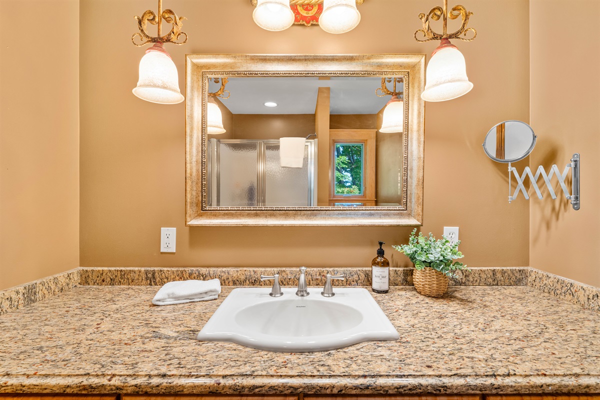 The primary ensuite bathroom includes a shower and oversize vanity for lots of storage.