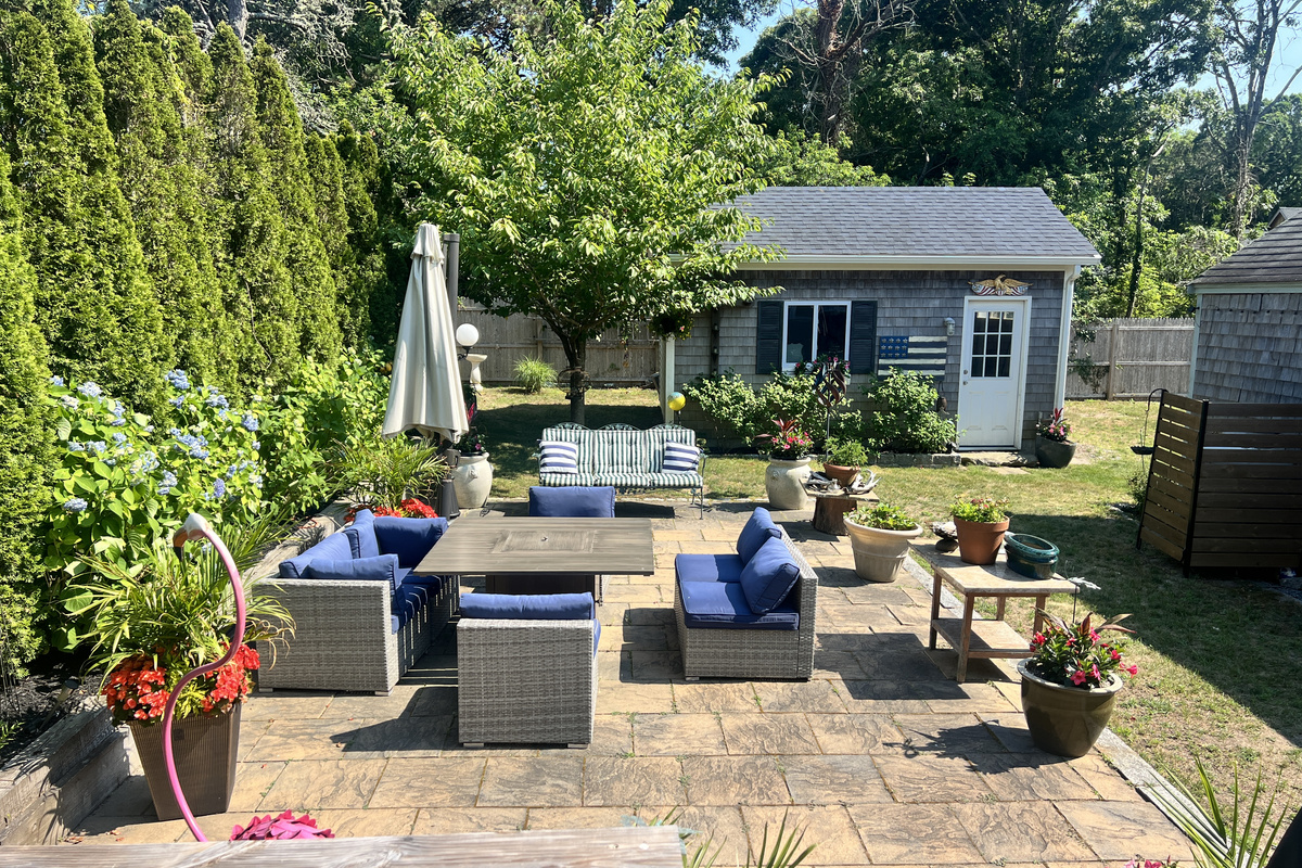 Outdoor patio lounge area with comfortable seating