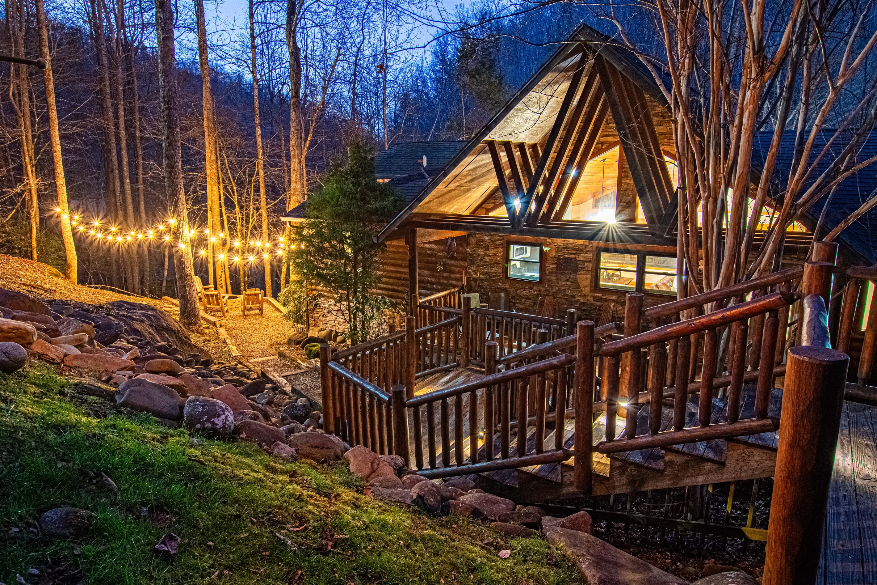 Welcome to Rocky River Lodge! Twilight is a special time - unwind from a day of hiking nearby and get ready to hit the town! Or enjoy the fire pit and hot tub while listening to the river ramble by.