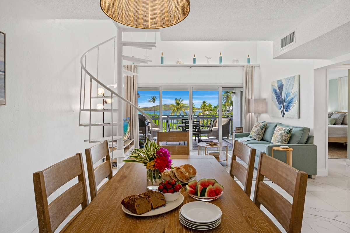 The open dining area flows effortlessly into the kitchen and living room.