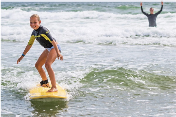 Surfing for the kids right out front