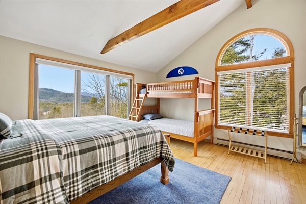 Second floor bedroom with queen bed and twin-over-twin bunk bed view 1