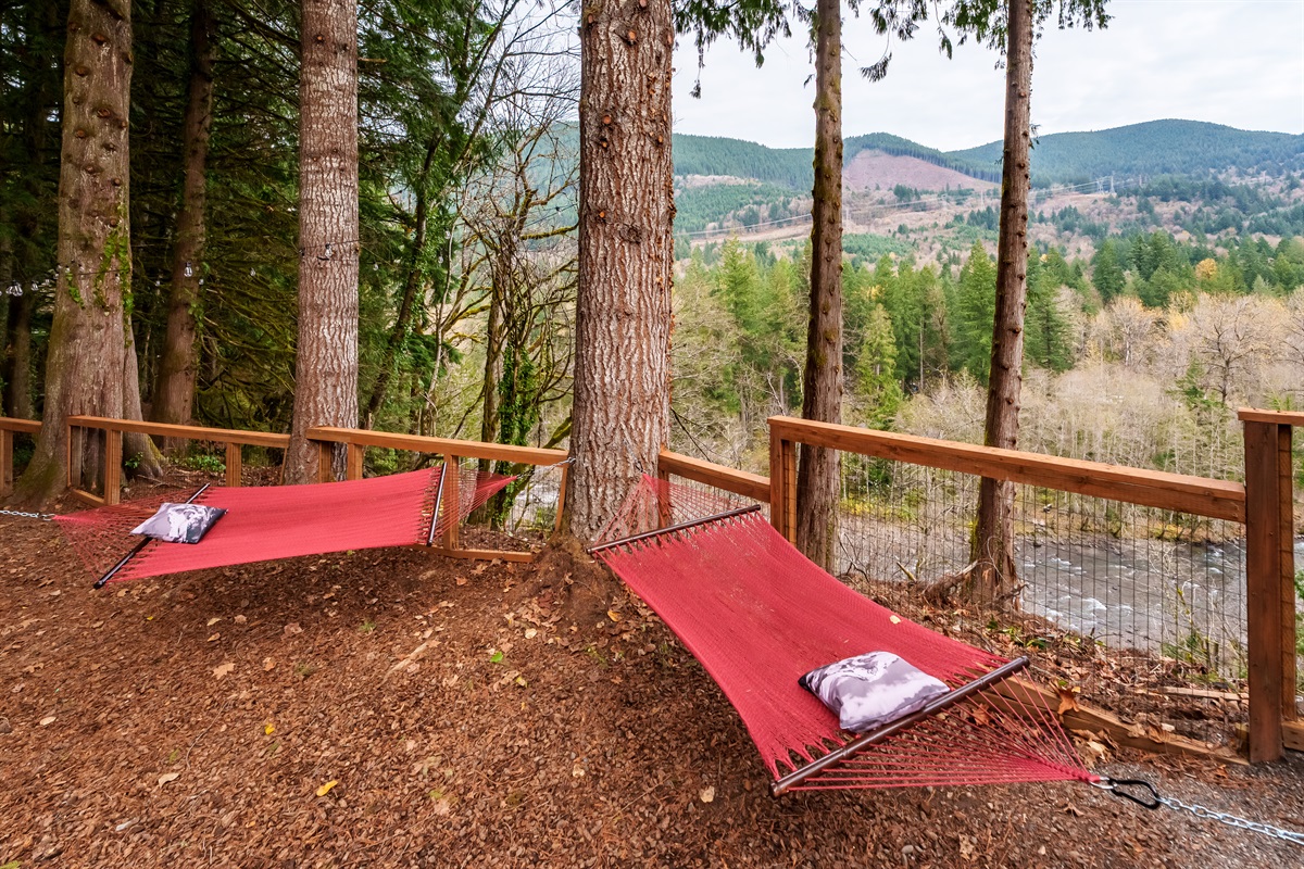 Unwind in the riverside hammock grove, tucked beneath towering trees with peaceful mountain views—your perfect spot for reading, napping, or simply breathing in the forest air.