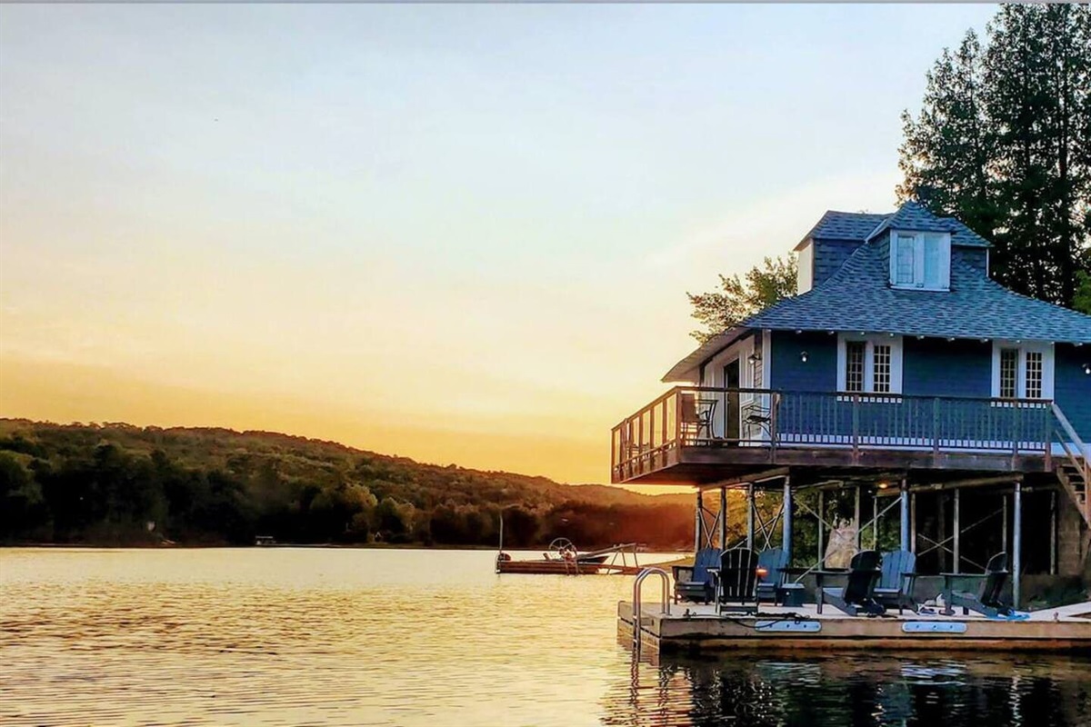 View of raised Boathouse from edge of Lac McGregor