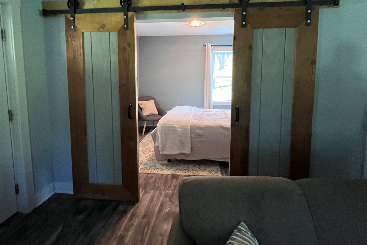 View from Living Room to Main Floor Bedroom