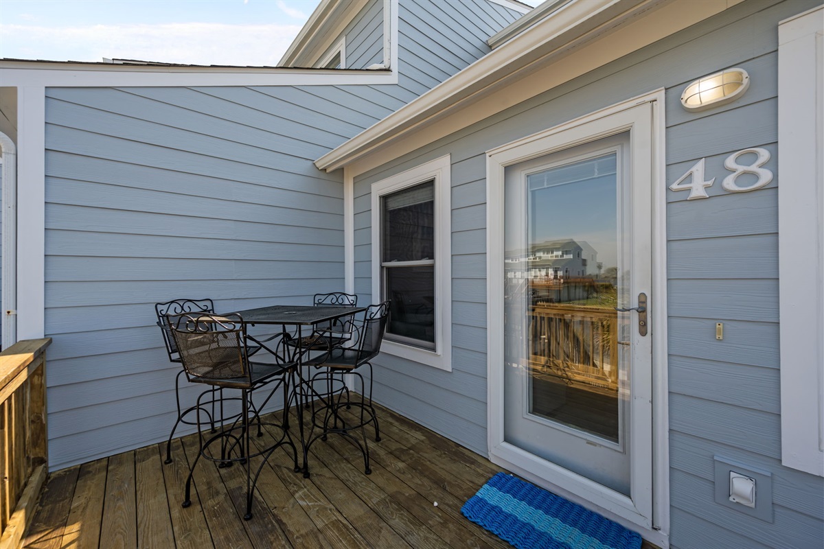 Outdoor dining table on private deck