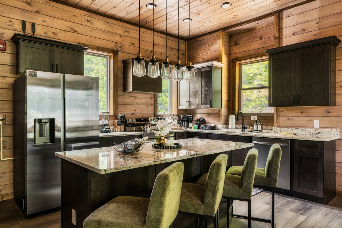 Dining area and fully equipped kitchen — designed for group meals and entertaining.