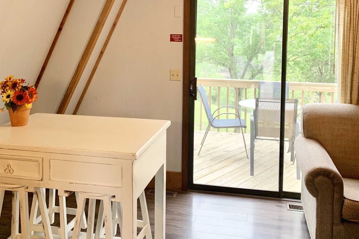 Seating for 4 in the dining area with additional outdoor seating