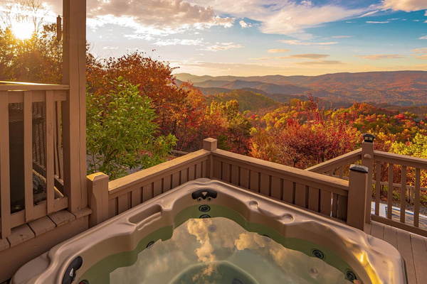 Hot tub on the deck between ground and main levels, with valley views, Tanasi Lodge