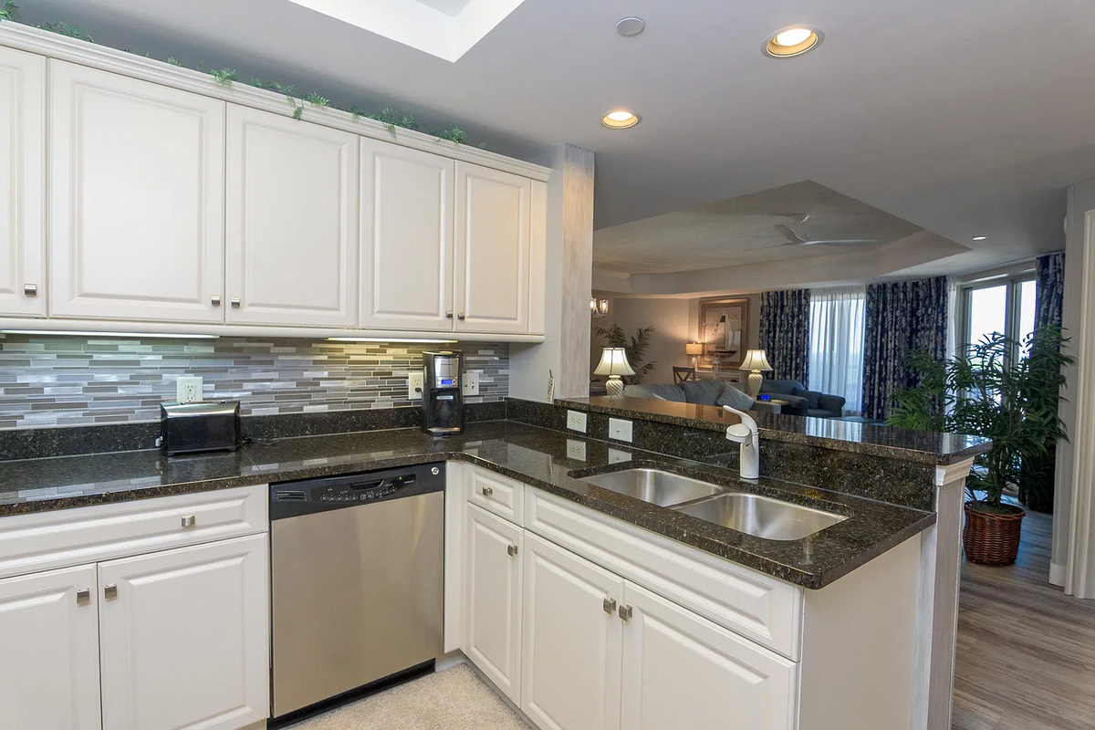 Well stocked kitchen with stainless Steele appliances and all you need for meal preparation