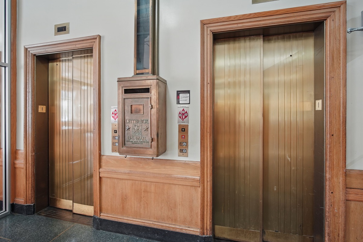 Ride the original brass elevators and discover the historic mail chute—an authentic touch from the Kirkwood’s storied past. These small details bring the building’s history to life throughout
