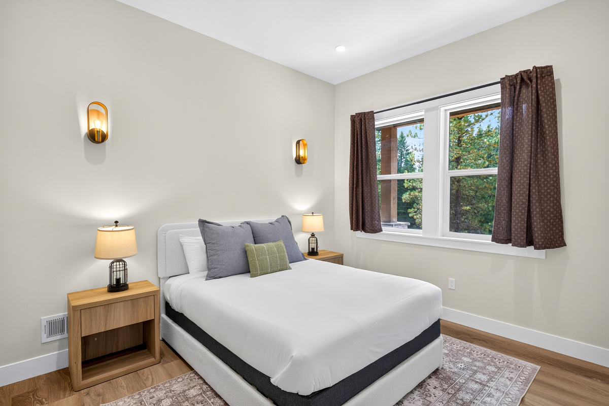 Recharge after a long day enjoying nature in this queen bed in bedroom #2 on the first floor