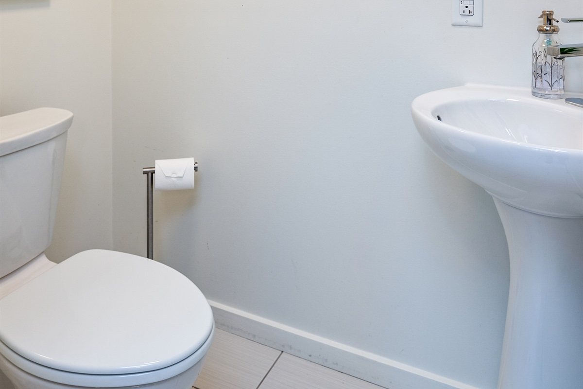 Clean and simple half bath with modern fixtures—perfect for quick fresh-ups 🚽✨
