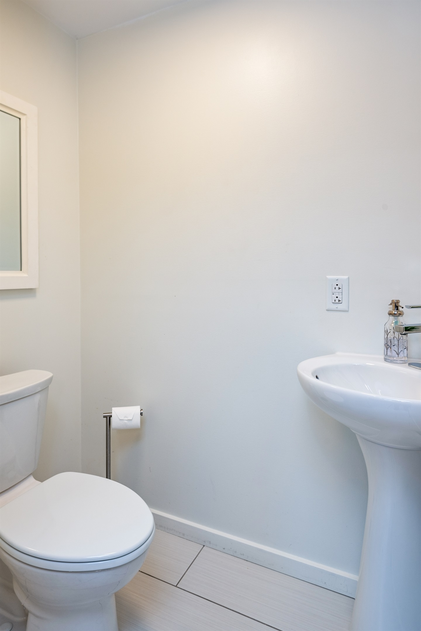 Clean and simple half bath with modern fixtures—perfect for quick fresh-ups 🚽✨