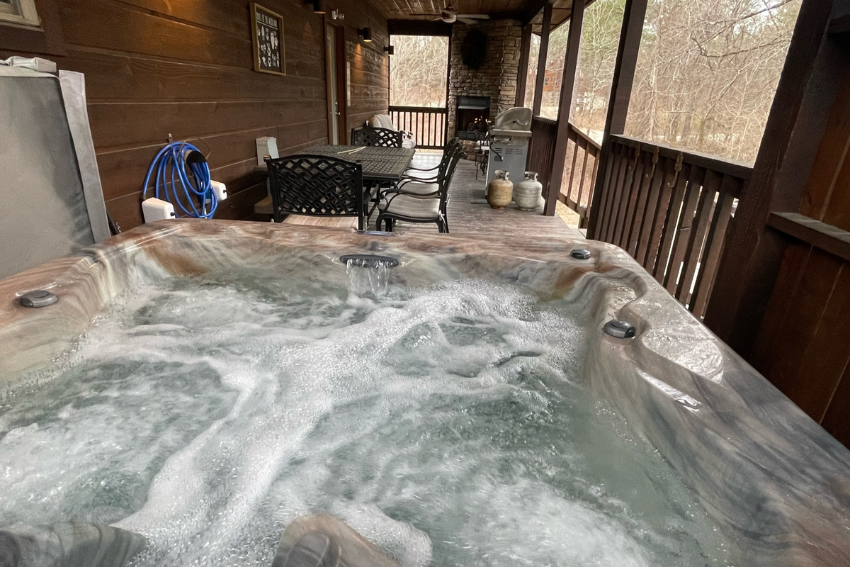 Just looking at this relaxing hot tub soothes your aching muscles.