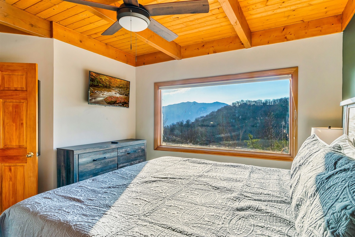 Lower Level King bedroom with premium bedding & pillows to unwind after a day exploring Gatlinburg