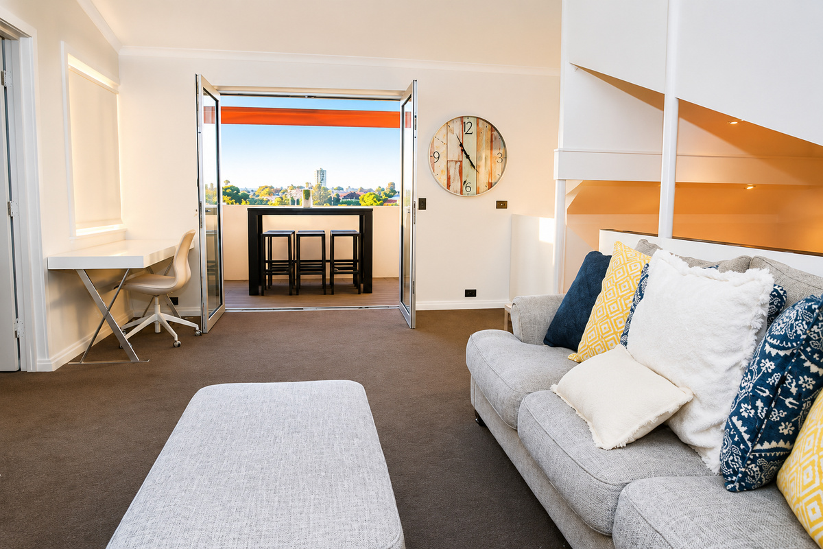 Additional living room space at Sant’s Beach Retreat, giving the home another indoor zone beyond the main dining and kitchen area.