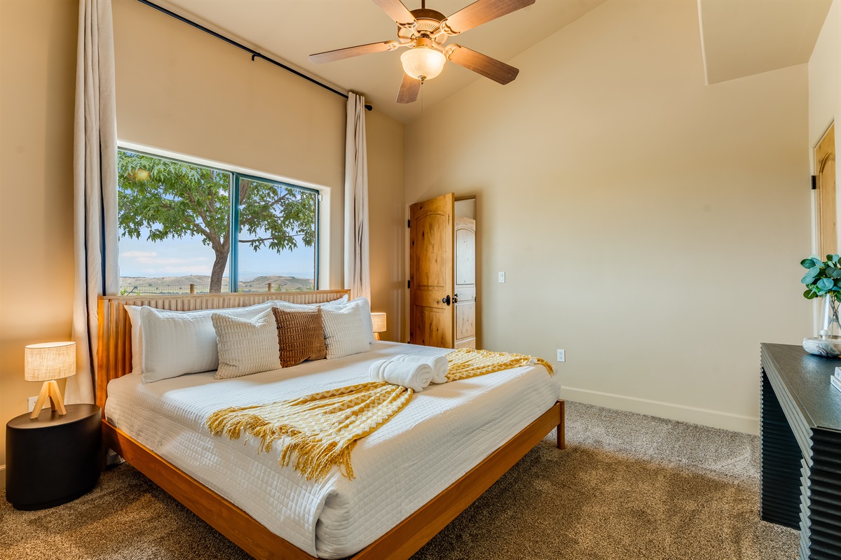 Downstairs Bedroom 3 with King sized bed and attached “Jack and Jill” bathroom