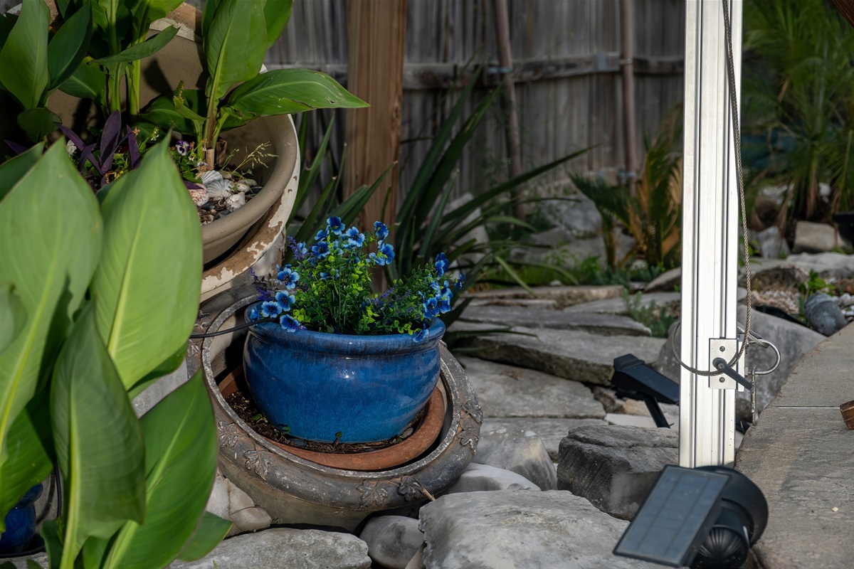 Naturally shaded patio made of Texas limestone that stays cool on hot summer days.