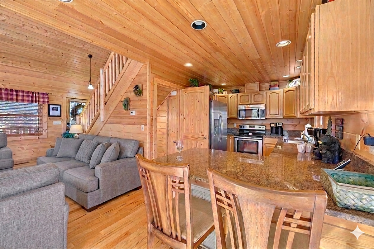 Gather in this bright and welcoming space where the kitchen, dining, and living areas come together. Perfect for cooking, chatting, and sharing laughter after a day in the mountains.