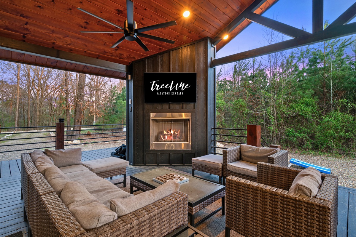 With a fireplace and TV outside, this space becomes a go-to hangout spot where you can relax, watch a game, or unwind after a full day.