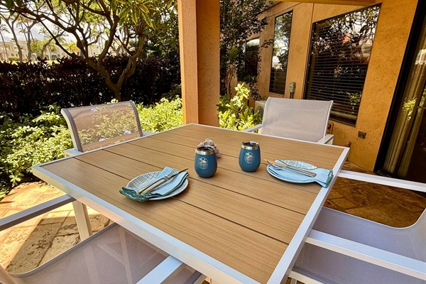 Enjoy meals at the lanai dining table