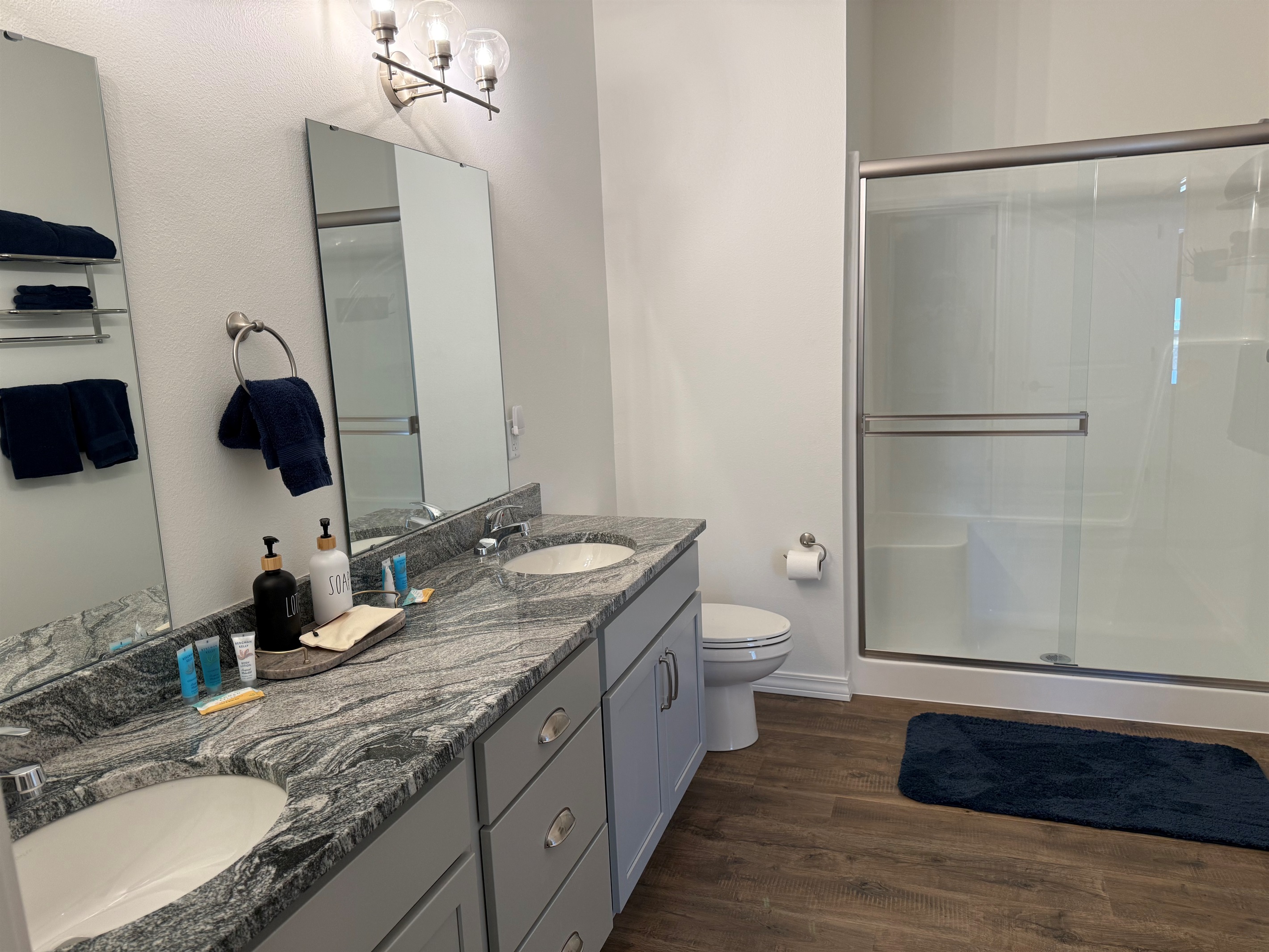 En-suite Master Bedroom Bathroom with closet and dual sinks. Huge walk in shower with glass door