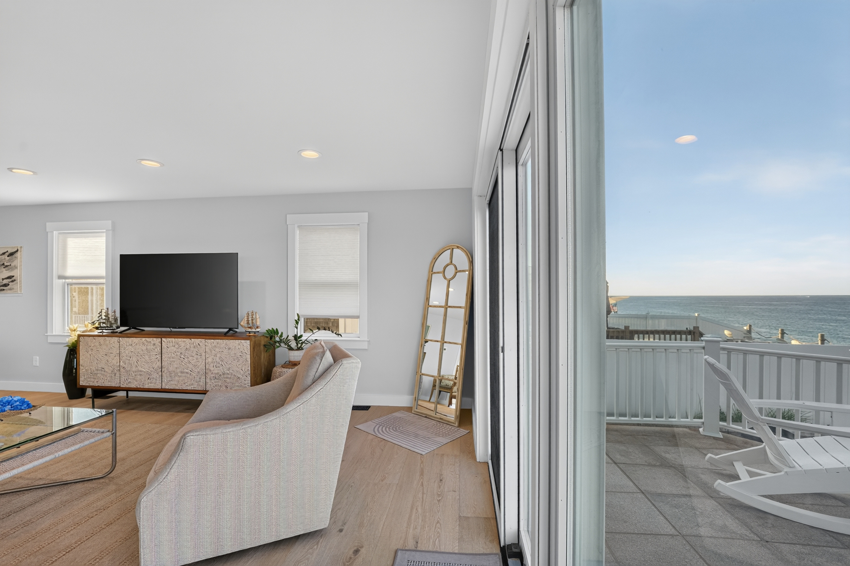 Enjoy seamless access from the living room to the private oceanfront deck
