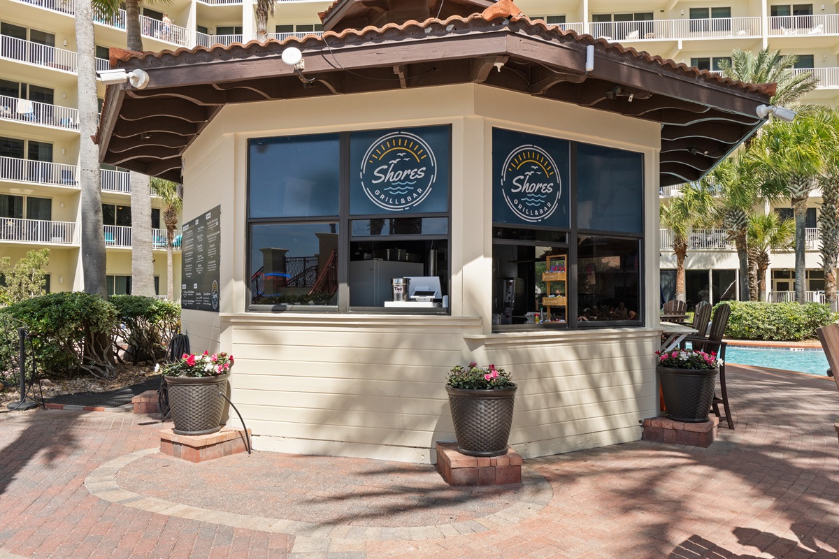 Enjoy Shores Grill & Bar for drinks and a nice variety of seafood, salads, pizza and burgers.